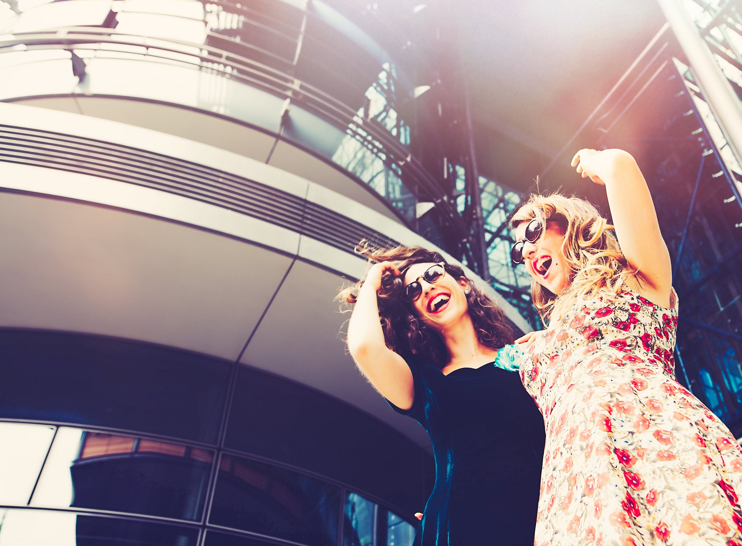 Women having fun in shopping center